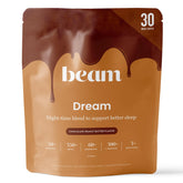 Beam Dream Sleep Powder envase con cacao, ideal para una rutina nocturna relajante.