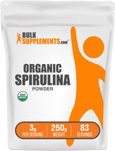 BulkSupplements Spirulina Orgánica polvo y cuchara de medición, ideal para batidos diarios.