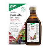 Floradix Floravital: botella vertiendo el líquido de color ámbar.