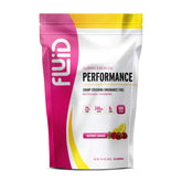 Fluid Performance se vierte en la botella; hidratación para entrenos intensos.