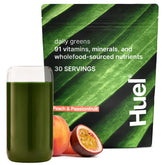 Huel Daily Greens durazno maracuya pote, ideal para iniciar el día con nutrientes.