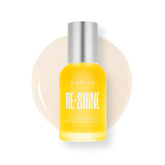 MAËLYS RE-SHINE sérum corporal, botella elegante para brillo suave.