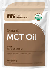 Micro Ingredients MCT en polvo orgánico, botella vertiendo, perfecto para incorporar en bebidas energéticas.