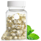 Ritual multivitamínico para mujeres 18+ en botella menta, apoyo diario de nutrientes.