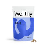 Wellthy Termogénico Nocturno cápsulas junto a la caja, apoyo para la relajación nocturna.