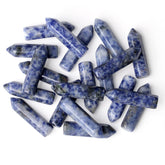 Puntas hexagonales azules de YATOJUZI para enfoque y equilibrio energético.