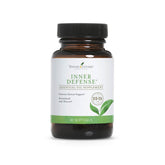 Young Living Defensa Interna, botella derramando, aroma herbáceo para apoyo diario.