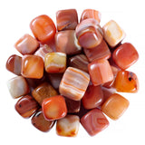 ABHISUBYA Carnelian, primer plano de piedras pulidas para decoración y energía suave.