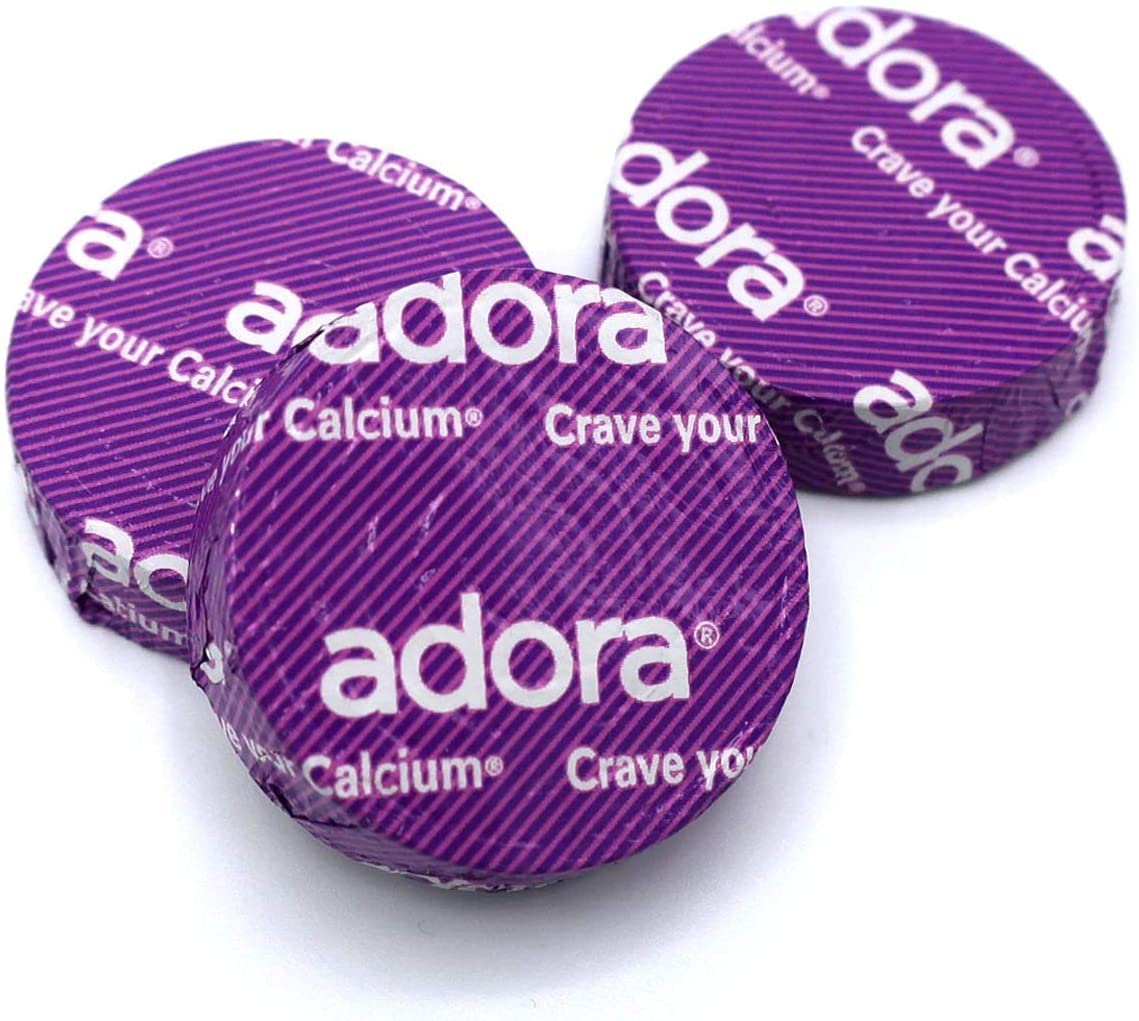 Disco de chocolate oscuro Adora Calcium, sabor indulgente para snack saludable.