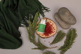 Botella de aceites de Aera Forest Therapy, primer plano de la fragancia.