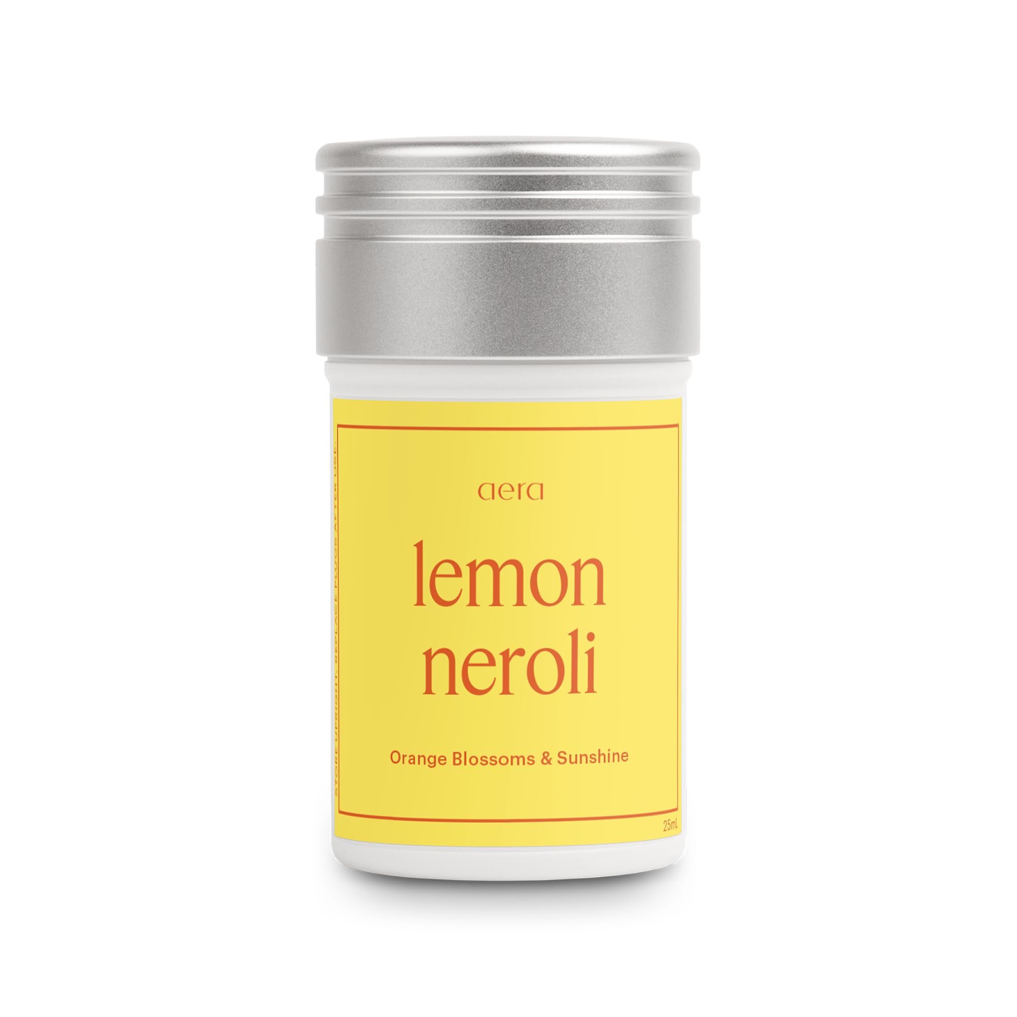La fragancia AERA Limón Neroli en botella para ambientar espacios con aroma suave.