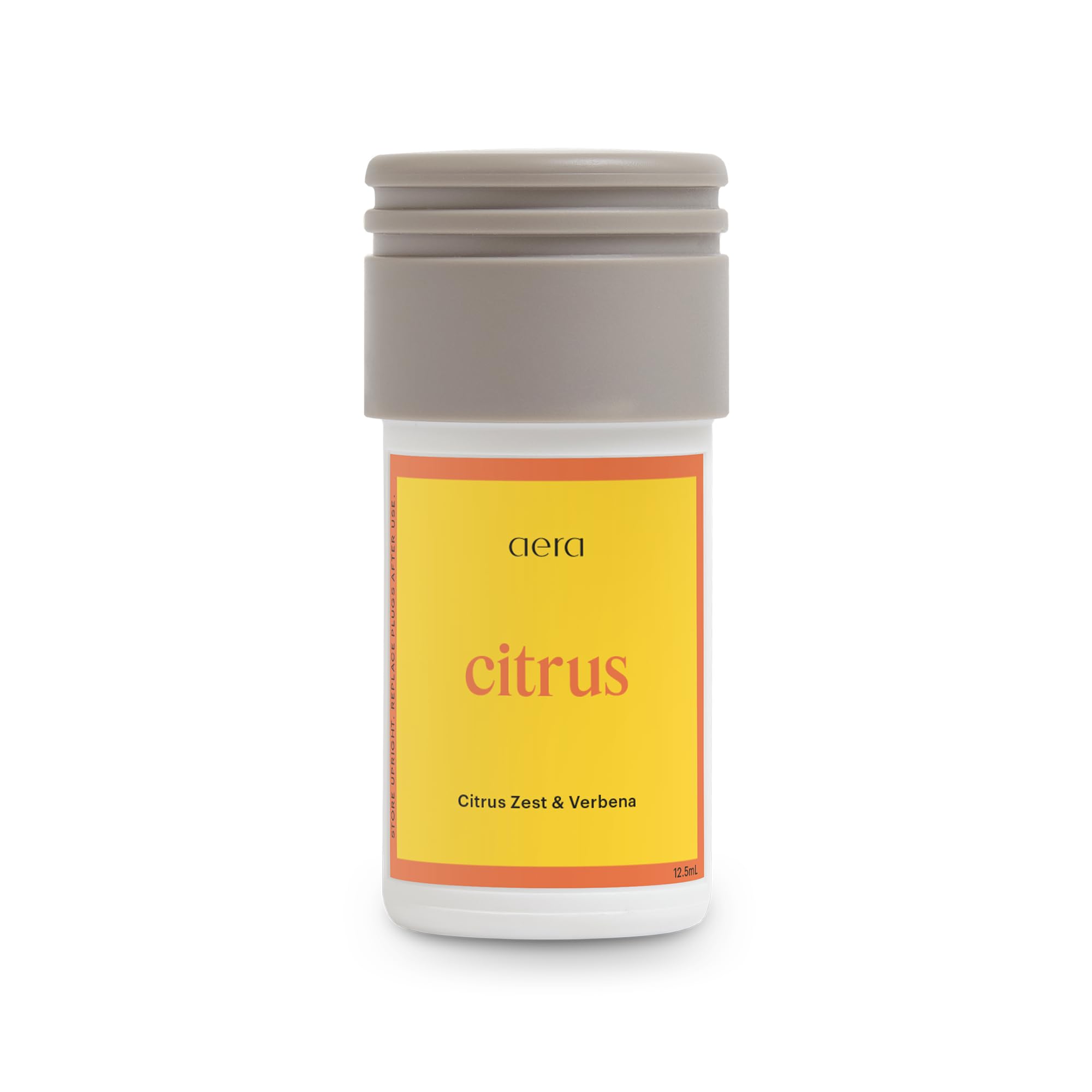 AERA Mini Citrus fragancia limón para refrescar salas y espacios pequeños.