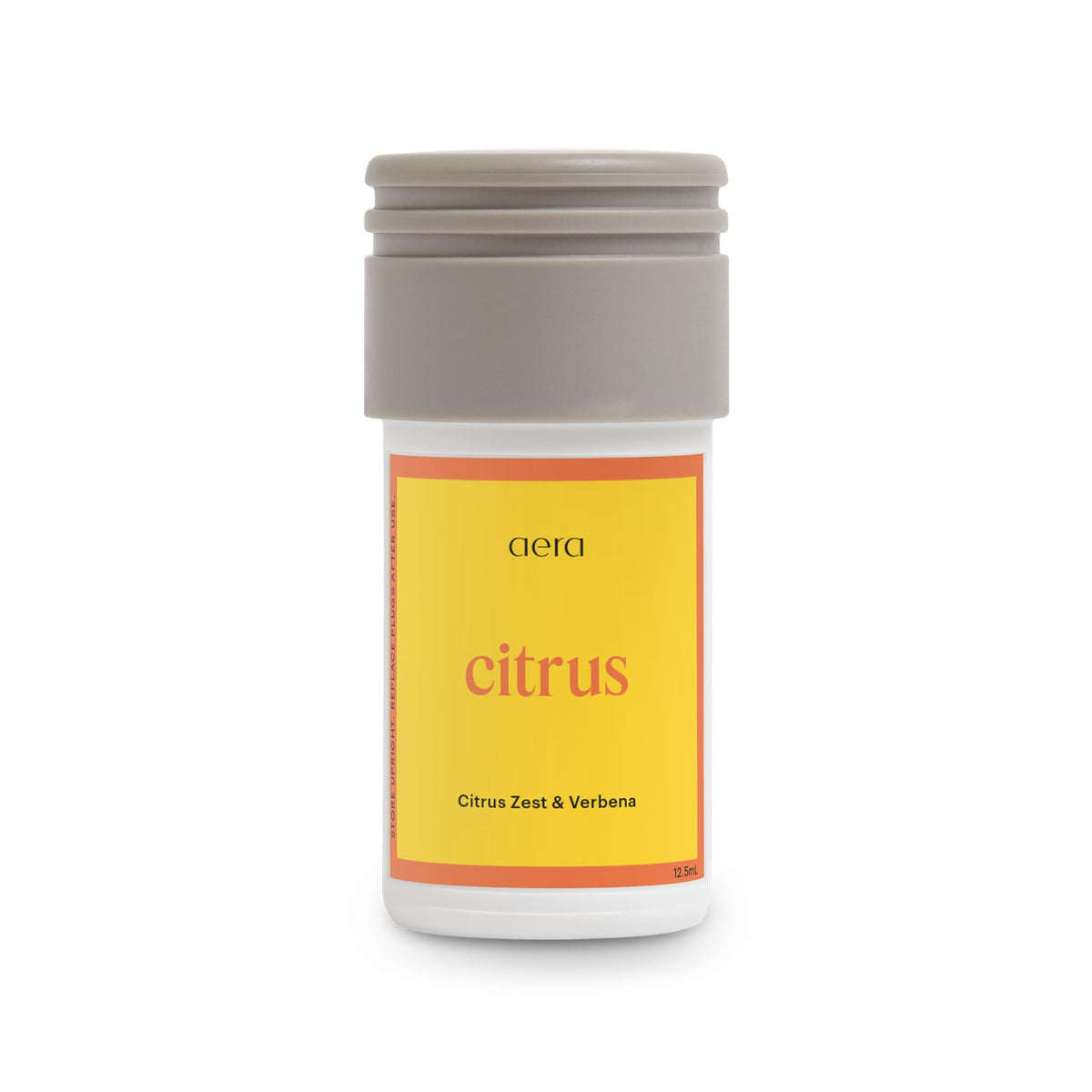 AERA Mini Citrus fragancia limón para refrescar salas y espacios pequeños.