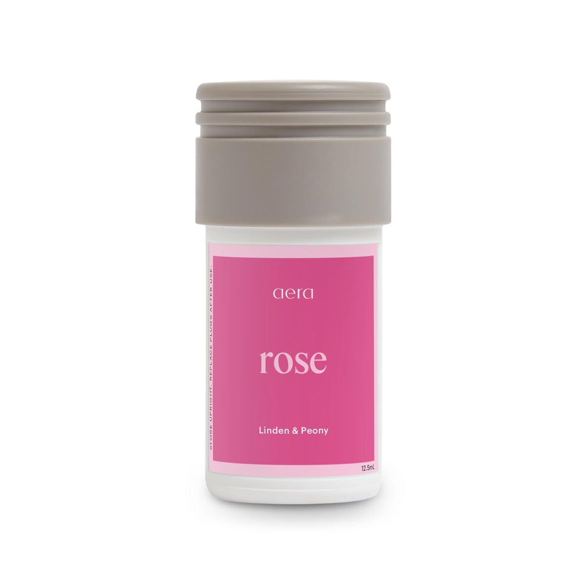 AERA Aera Mini Rosa – botella de fragancia floral para espacios elegantes y frescos.