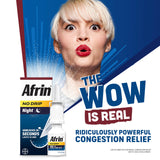 Afrin nocturno atomizador nasal con aroma suave de manzanilla para dormir.