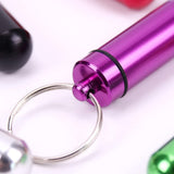 AKOAK botella morada con clip llavero, ideal para llevar en viajes.