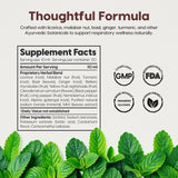 AKSHAR Tulsin Jarabe: mezcla herbal para bienestar pulmonar.