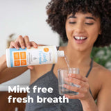 Aliento fresco todo el día con Oxyfresh enjuague bucal.