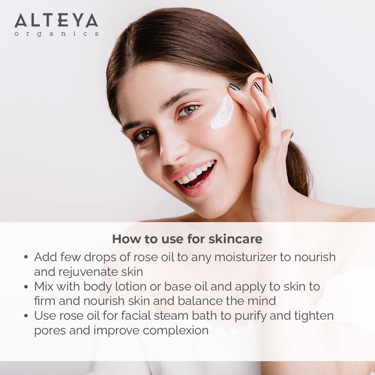Alteya Organics frasco y gotero junto a rosas, destacan lujo y pureza.