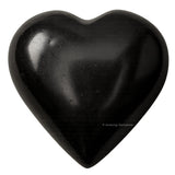 Amazing Gemstone: corazón de tourmalina negra para masaje suave.