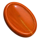 Amazing Gemstone: Piedra jaspe rojo en la mano para relajación y enfoque.