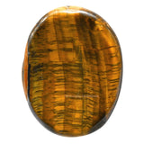 Amazing Gemstone Tiger Eye Worry Stone, en la mano para relajación y anclaje durante la sesión.