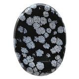 Amazing Gemstone piedra obsidiana copos de nieve junto a vela para concentración