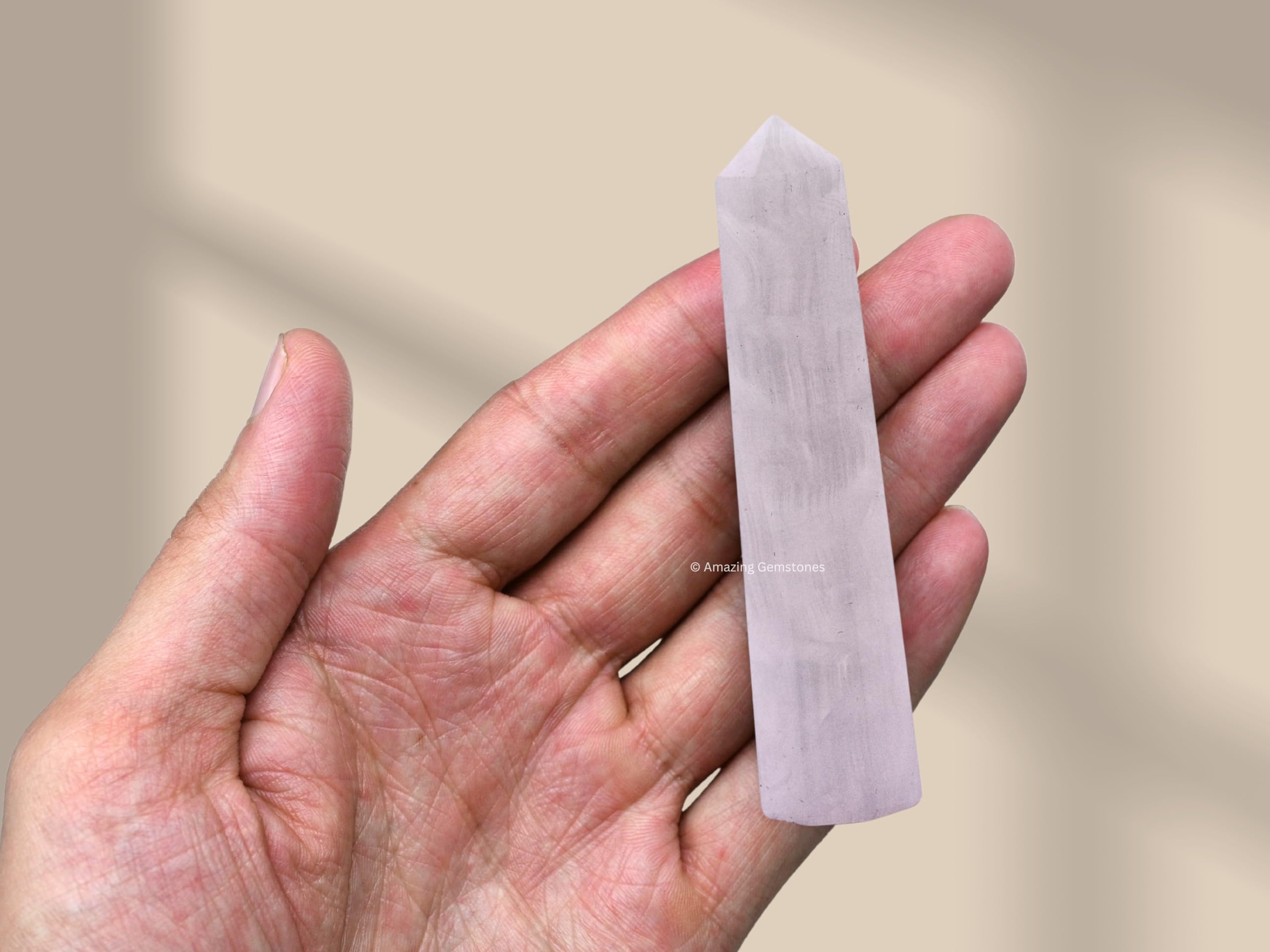 Amazing Gemstone Pink Calcite: torre-punta puede servir como foco para purificación del ambiente.
