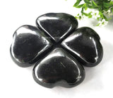 Amazing Gemstone: palma con tourmalina negra para masaje en bolsillo.