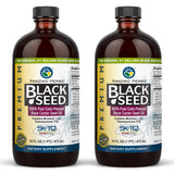 Amazing Herbs Aceite de Semilla Negra: vertido de la botella para uso culinario suave.
