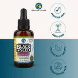 Aceite Amazing Herbs goteando, ideal para realzar sabor y apoyar la digestión.