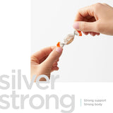 Detalle de textura suave de la pastilla American Biotech Labs Silver Biotics, sabor cítrico.