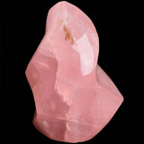 AMOYSTONE cuarzo rosa torre en llama, enfoque decorativo para armonía en el hogar.