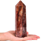AMOYSTONE punta cristal concentrando energía para enfoque emocional.