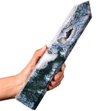 AMOYSTONE punta de cristal dirige energía para prácticas de bienestar.
