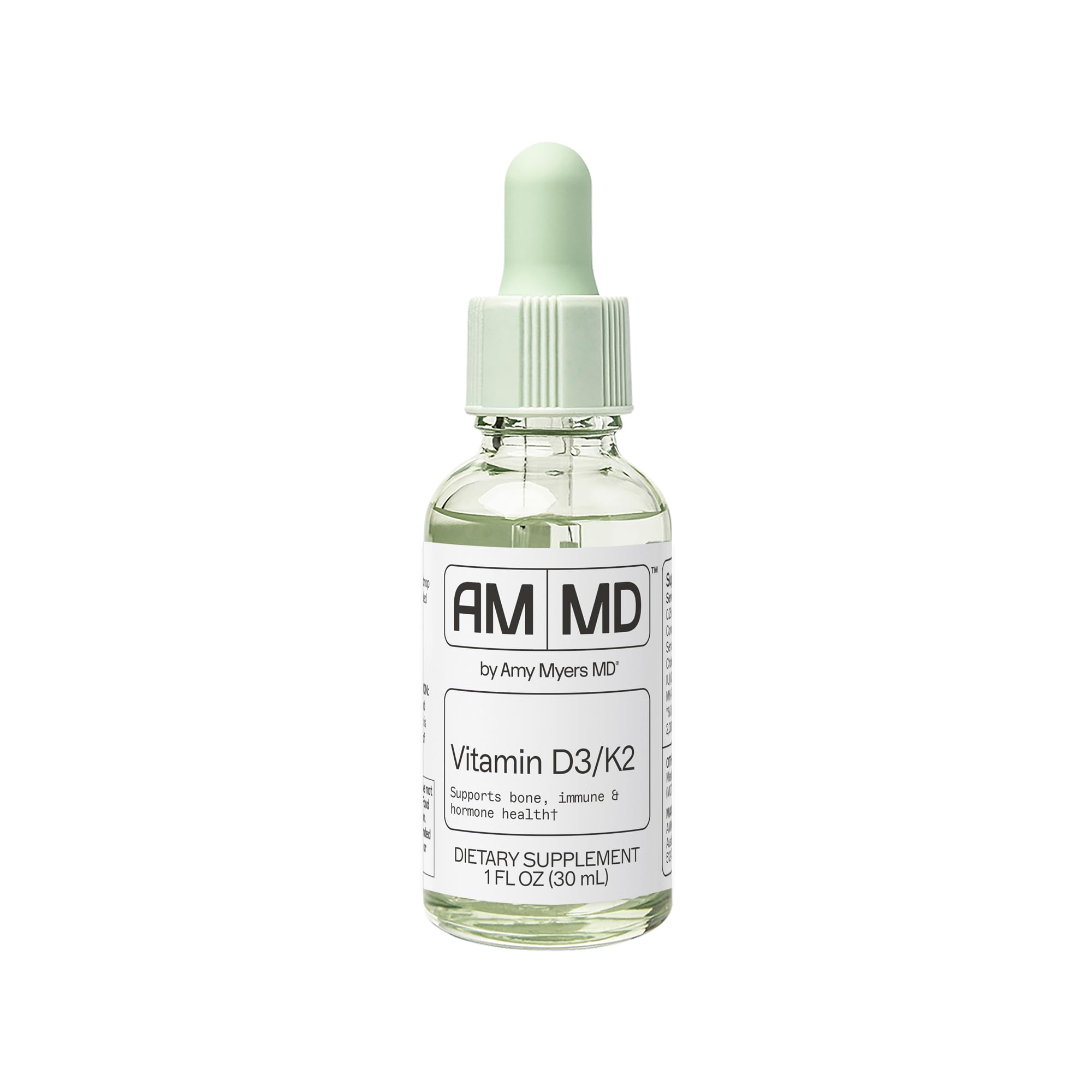 Vitamina D3/K2 de Amy Myers MD, botella vertiendo, apoyo óseo diario.