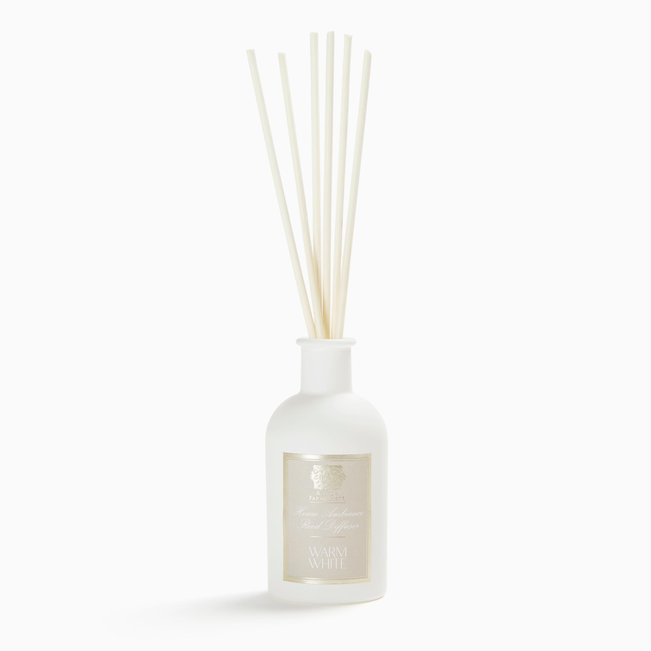 Difusor de varillas Antica Farmacista en vaso de cristal para ambientar salones.