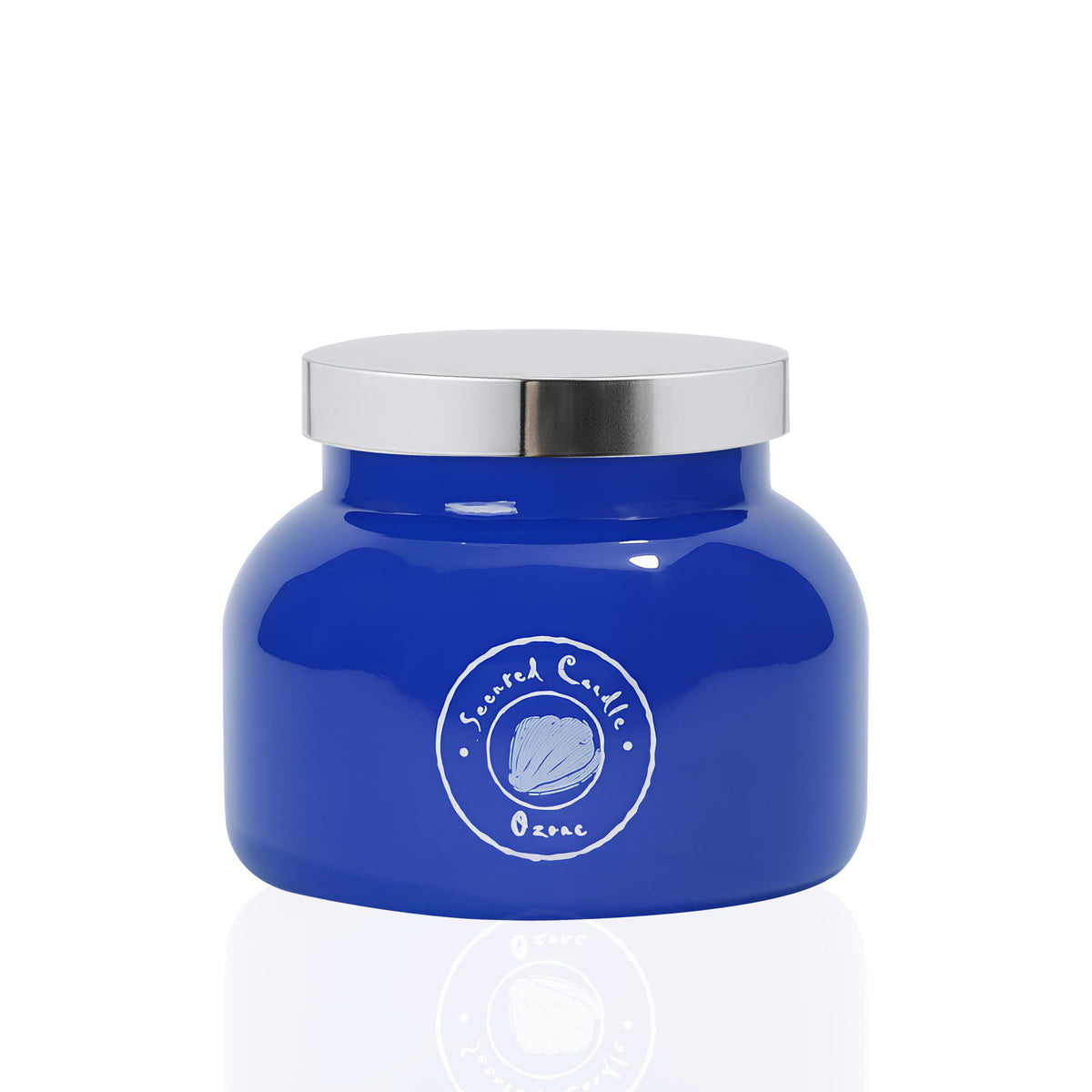 Vela Aroma Bay Ozone en vaso de vidrio azul con tapa plateada para decoración moderna.