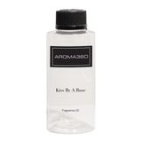 Aroma360 Kiss rosa en botella, perfuma con elegancia y serenidad.