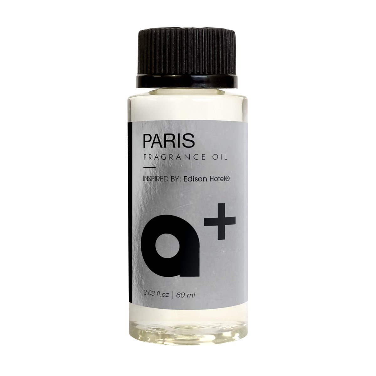 Aromar Plus: botella de aceite fragancia París inspirada perfuma espacios con elegancia.