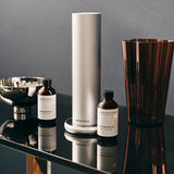 Etiqueta del producto AromaTech Calabaza y Especias en estantería elegante.