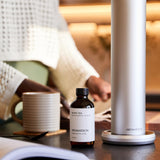 Etiqueta de marca AromaTech en envase elegante para exhibir.