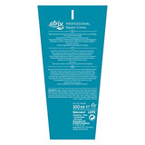 Atrix Crema Reparadora, textura suave para revitalizar el cabello.