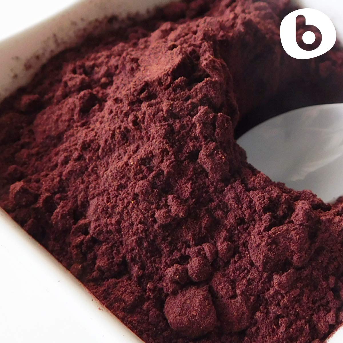 Polvo de Aronia Negra de la marca b, perfecto para batidos energéticos matutinos.