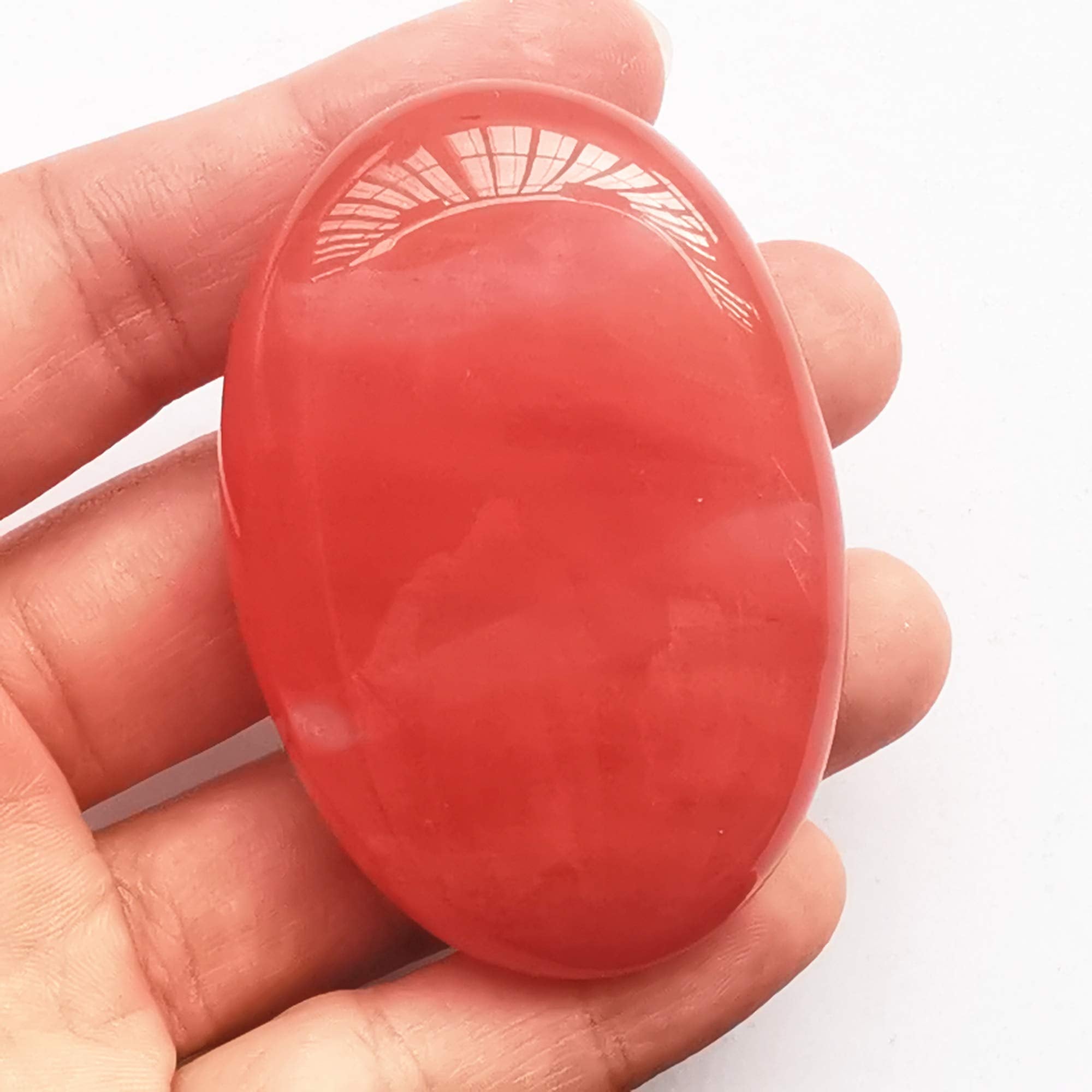Piedra curativa Bacatgem en bolsa regalo para meditación y bienestar diario.