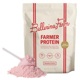 Proteína de suero alimentada con pasto de Ballerina Farm, tarro con sabor Fresa Crema para entrenamientos.