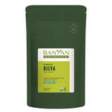 Banyan Botanicals Bilva polvo en empaque sostenible para almacenamiento y uso diario.