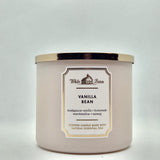 Bath & Body Works vela Vanilla Bean tres mechas: crea ambiente cálido y relajante.
