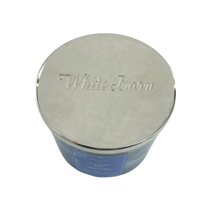 Vela Bath & Body Works White Barn ambienta sala con aroma de lavandería.