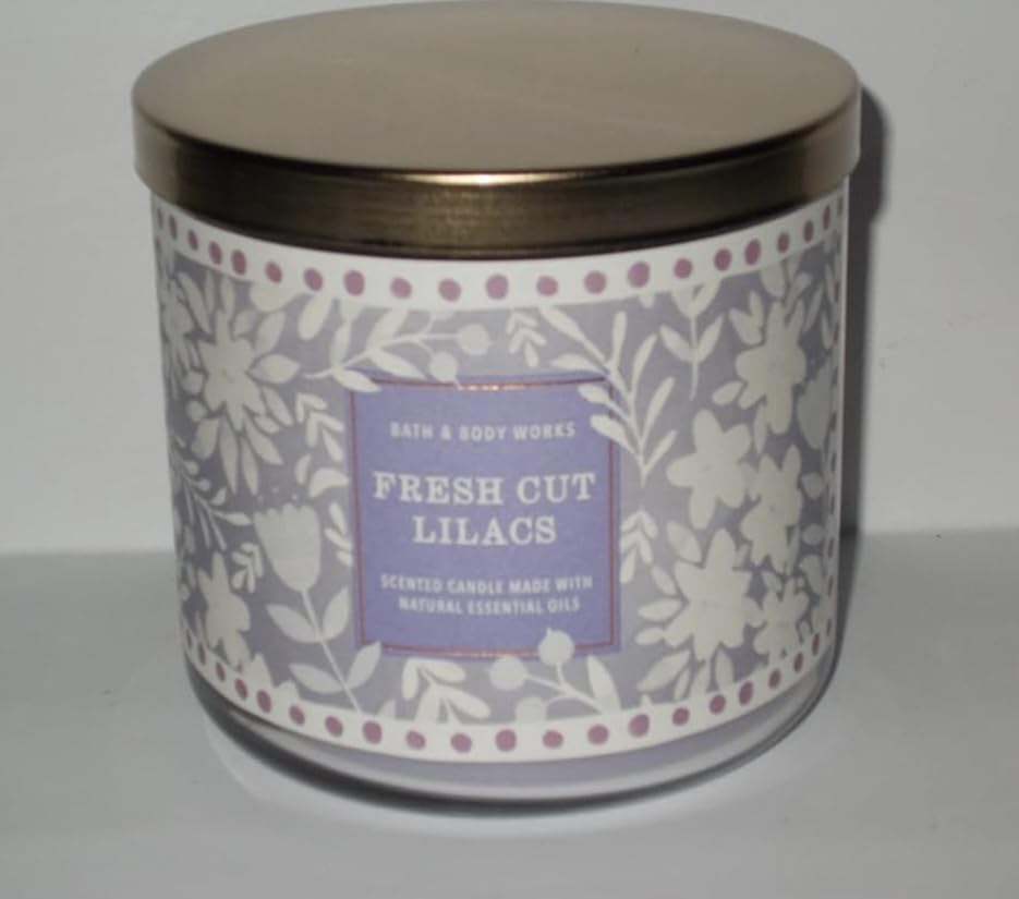 Bath & Body Works White Barn vela de tres mechas emite luz cálida y fragancia